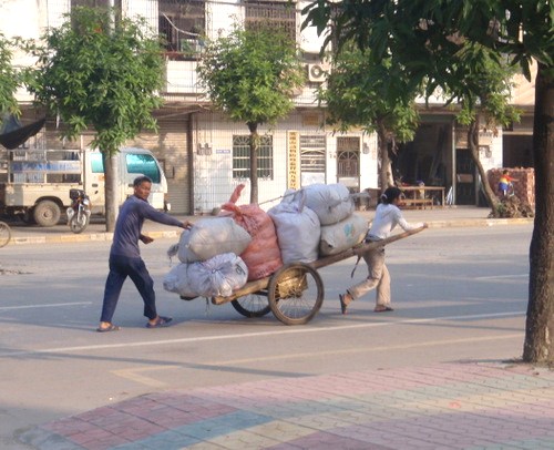 Family bringing goods to the market.